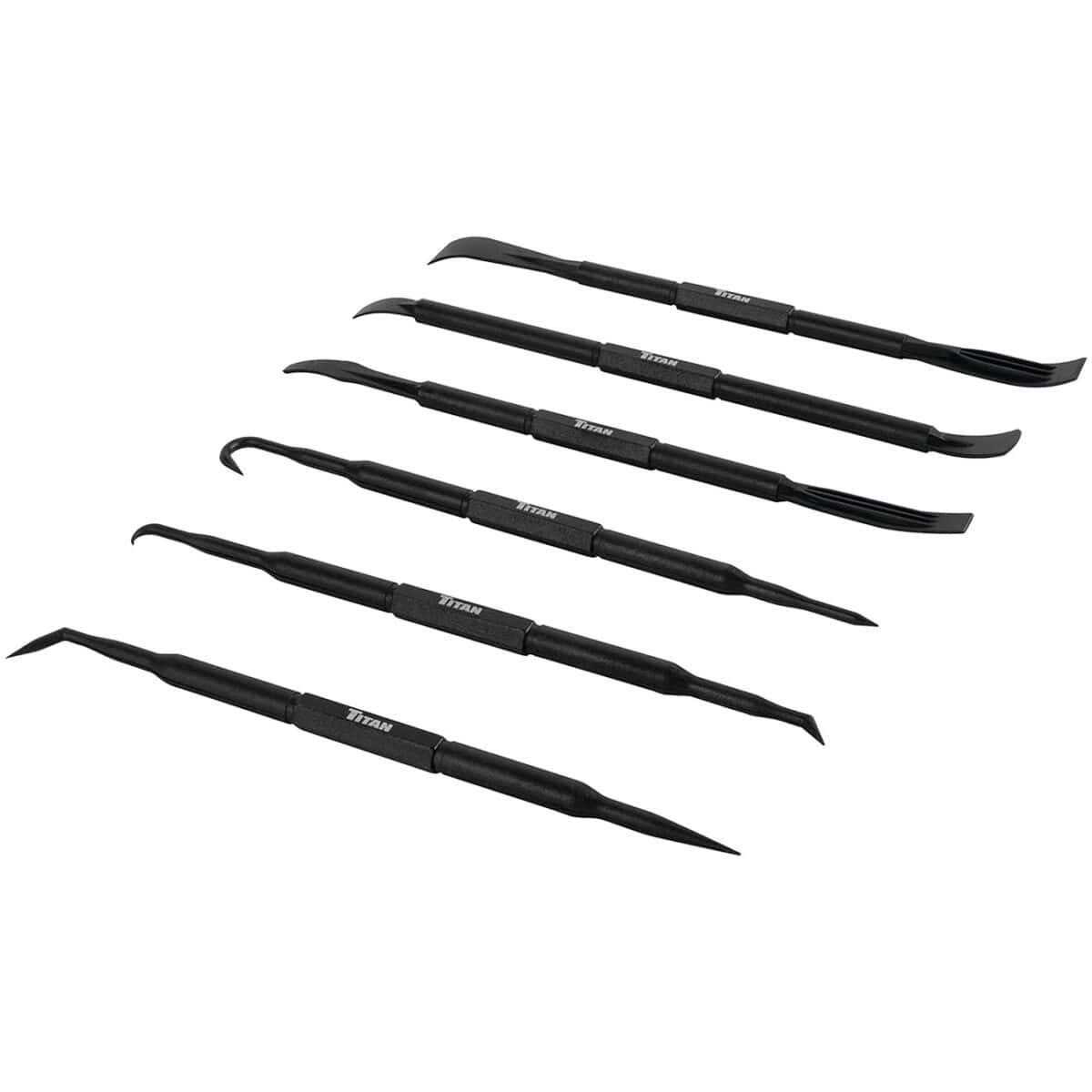 Professional dog grooming tools set with five black grooming tools for pet care.